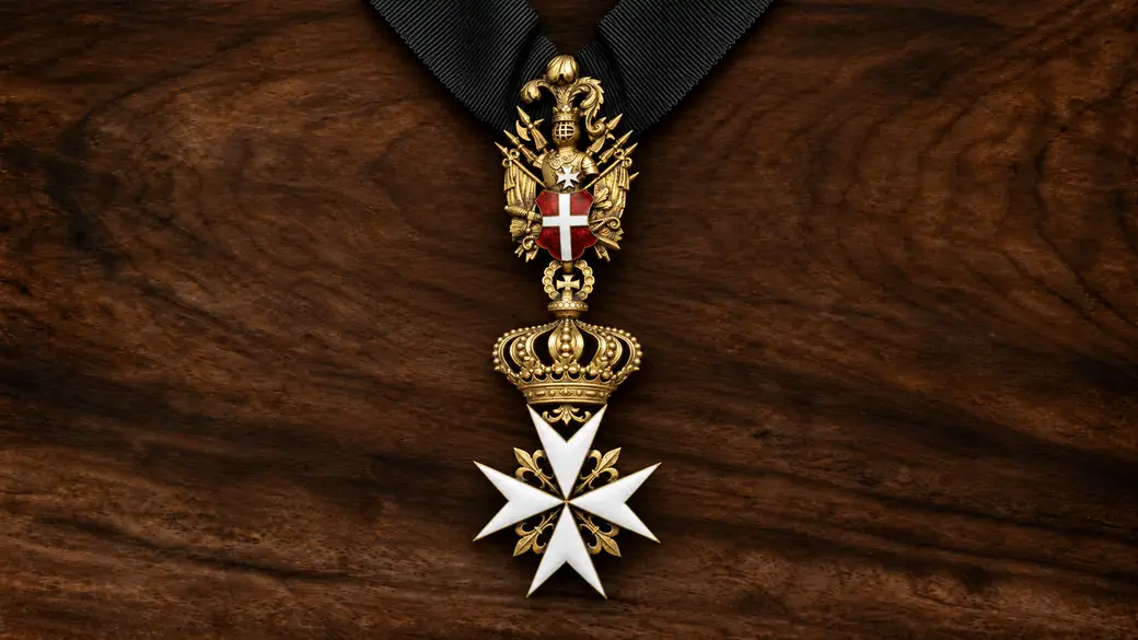 The white eight-pointed cross of the Sovereign Order of Malta